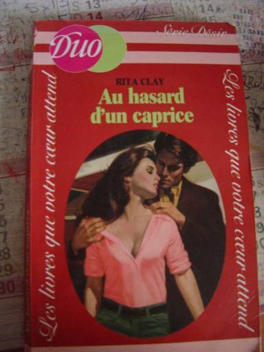 Couverture du livre Au hasard d'un caprice de Rita Clay